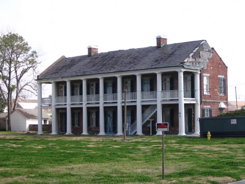 An antebellum structure being renovated.